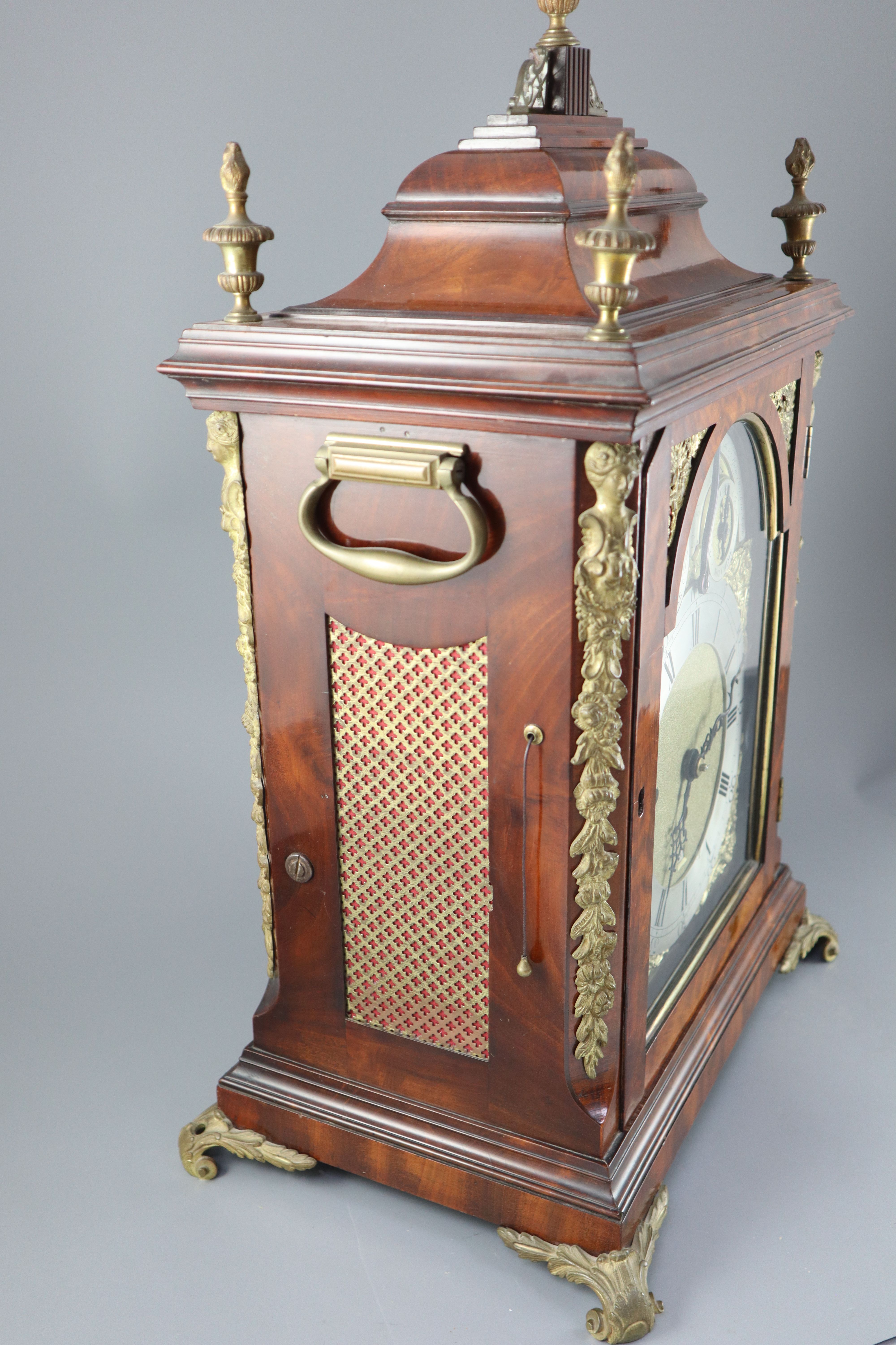 A good George III mahogany musical table clock playing six tunes, John Hovil, Fair Street, London